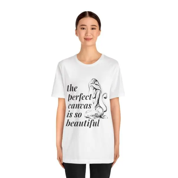 Woman wearing a graphic white T-shirt.