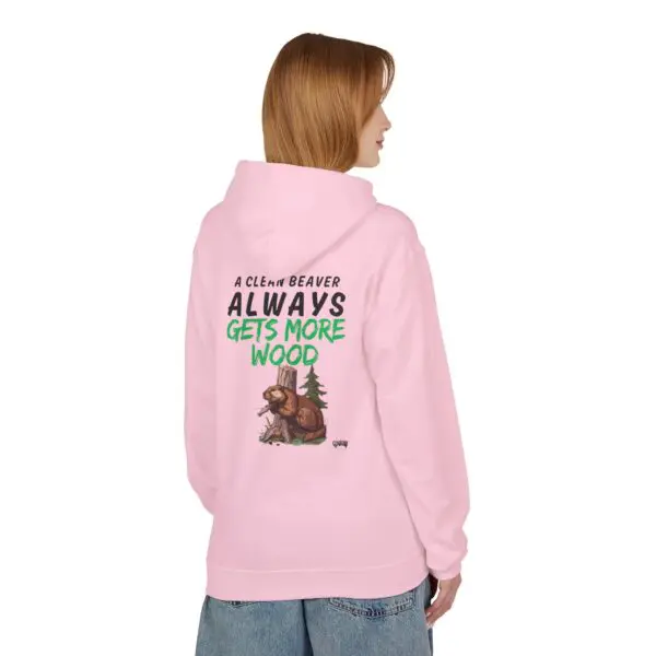 Woman in pink hoodie with beaver design.